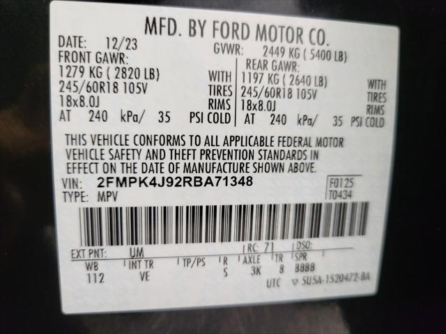 Photo of 2024 Agate Black Metallic Ford Edge
