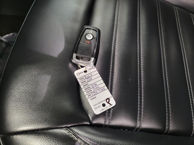 Photo of 2024 Agate Black Metallic Ford Edge