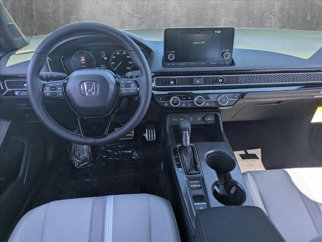 Photo of 2025 Platinum White Pearl Honda Civic Hybrid