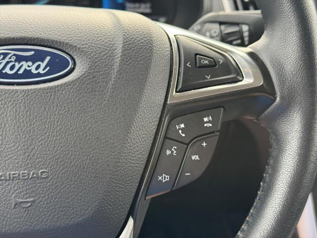 Photo of 2024 Agate Black Metallic Ford Edge