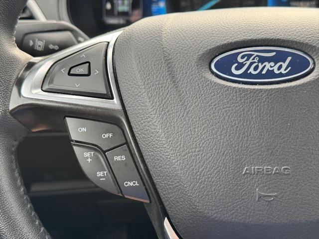Photo of 2024 Agate Black Metallic Ford Edge