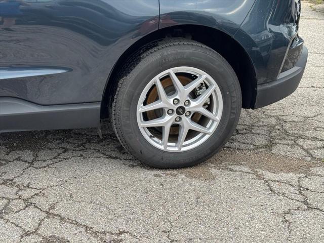 Photo of 2024 Stone Blue Metallic Ford Edge