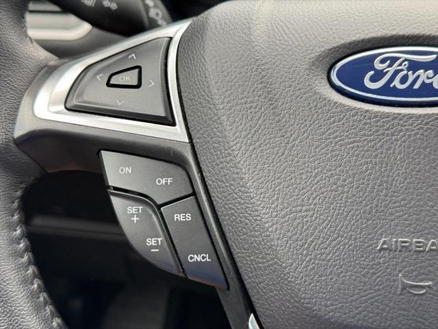 Photo of 2024 Stone Blue Metallic Ford Edge