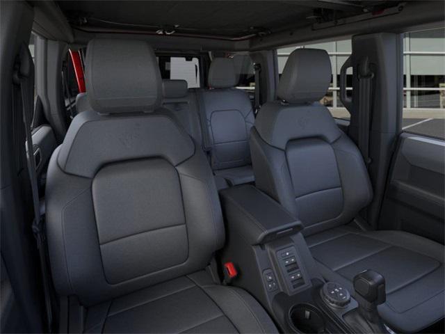 Photo of 2025 Ruby Red Metallic Tinted Clearcoat Ford Bronco