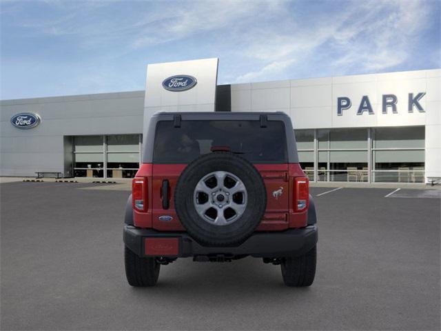 Photo of 2025 Ruby Red Metallic Tinted Clearcoat Ford Bronco