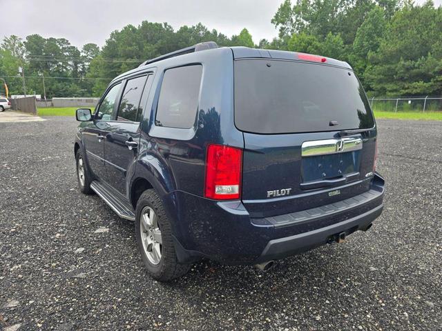 Photo of 2009 Bali Blue Pearl Honda Pilot
