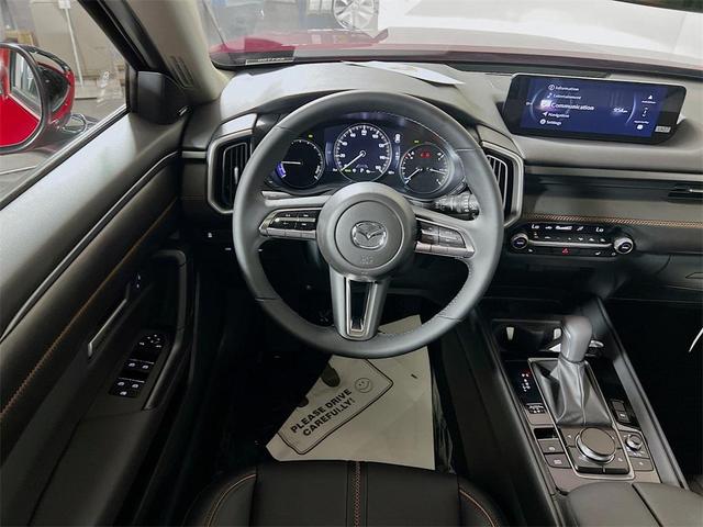 Photo of 2025 Soul Red Crystal Metallic Mazda CX-50 Hybrid