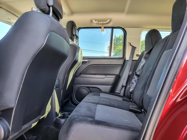 Photo of 2016 Deep Cherry Red Crystal Pearlcoat Jeep Patriot