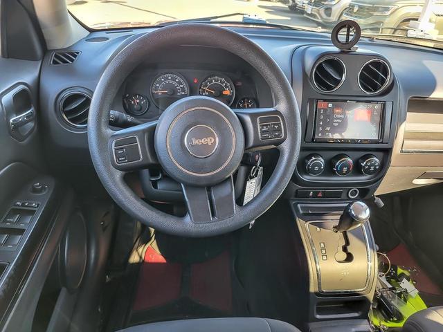Photo of 2016 Deep Cherry Red Crystal Pearlcoat Jeep Patriot