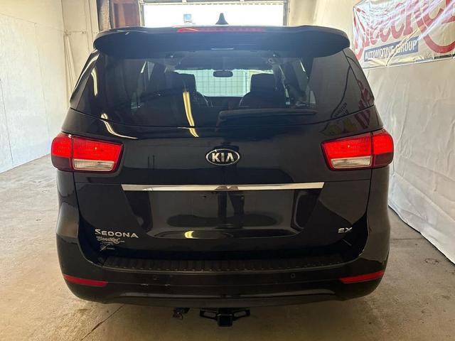 Photo of 2015 Aurora Black Kia Sedona