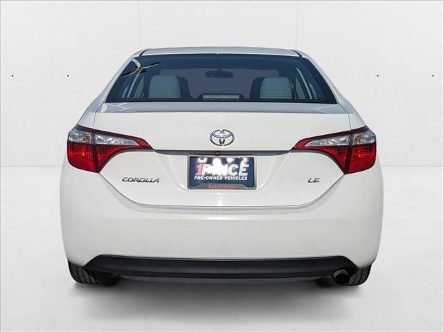 Photo of 2016 Super White Toyota Corolla