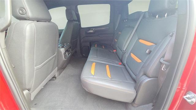 Photo of 2025 Volcanic Red GMC Sierra 1500