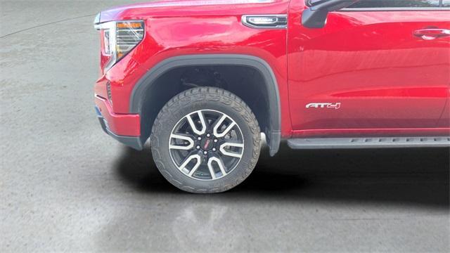 Photo of 2025 Volcanic Red GMC Sierra 1500