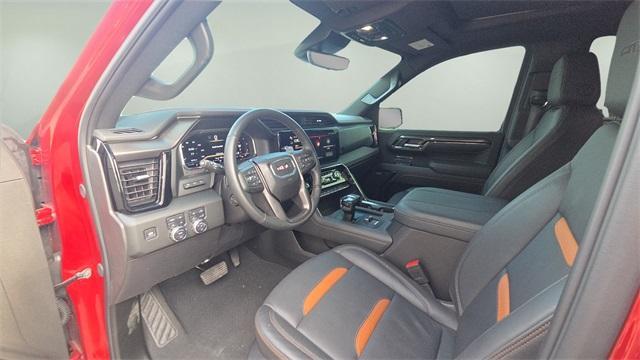 Photo of 2025 Volcanic Red GMC Sierra 1500