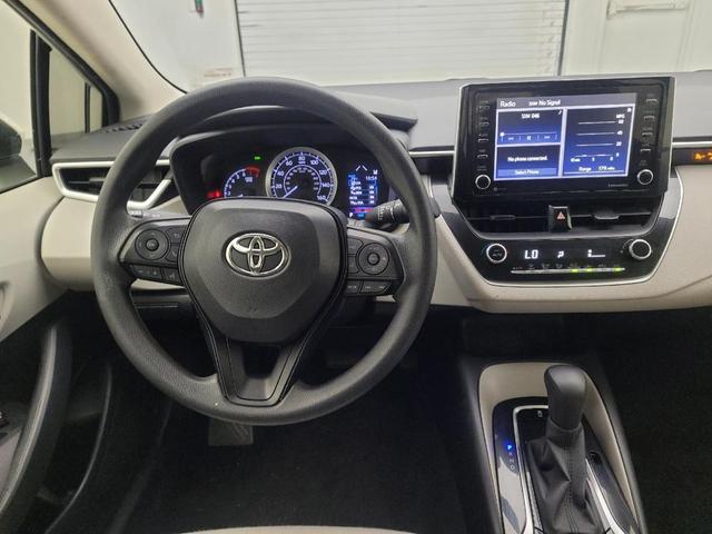 Photo of 2021 White Toyota Corolla