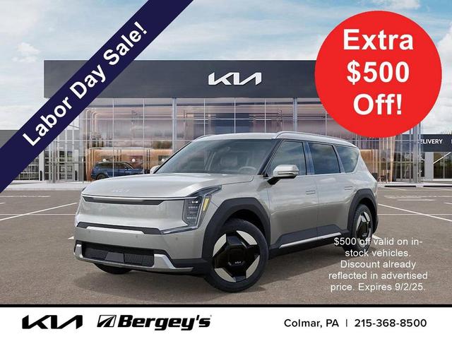 Photo of 2026 Ivory Silver Kia EV9