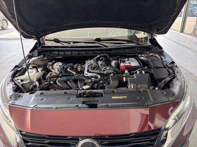 Photo of 2024 Garnet Pearl Metallic Nissan Altima