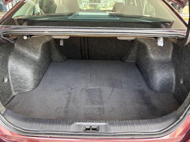 Photo of 2024 Garnet Pearl Metallic Nissan Altima