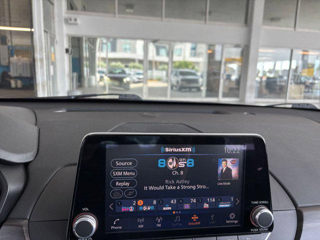 Photo of 2024 Garnet Pearl Metallic Nissan Altima