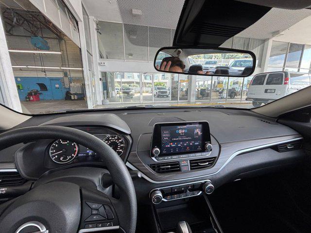 Photo of 2024 Garnet Pearl Metallic Nissan Altima