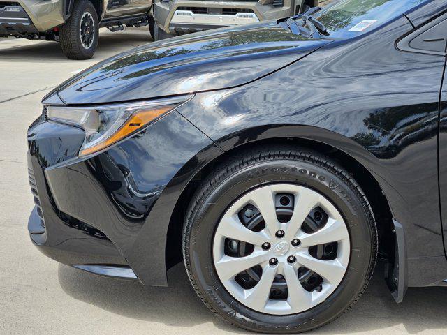Photo of 2025 Midnight Black Metallic Toyota Corolla