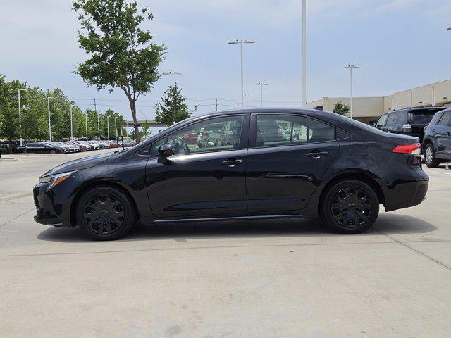 Photo of 2023 Midnight Black Metallic Toyota Corolla Hybrid