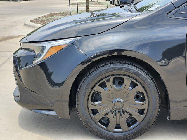 Photo of 2023 Midnight Black Metallic Toyota Corolla Hybrid