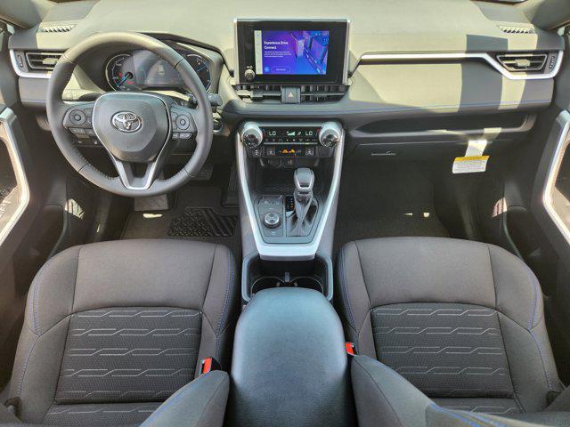 Photo of 2025 Wind Chill Pearl Toyota RAV4 Hybrid