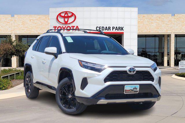 Photo of 2025 Wind Chill Pearl Toyota RAV4 Hybrid