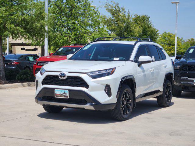 Photo of 2025 Wind Chill Pearl Toyota RAV4 Hybrid