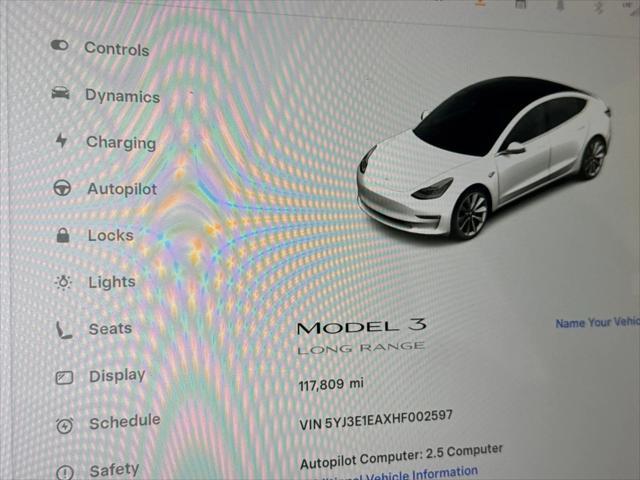 Photo of 2017 white Tesla Model 3
