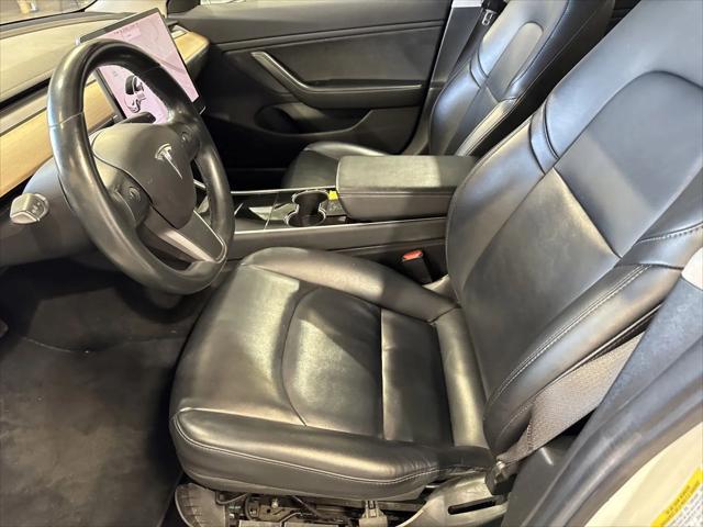 Photo of 2017 white Tesla Model 3