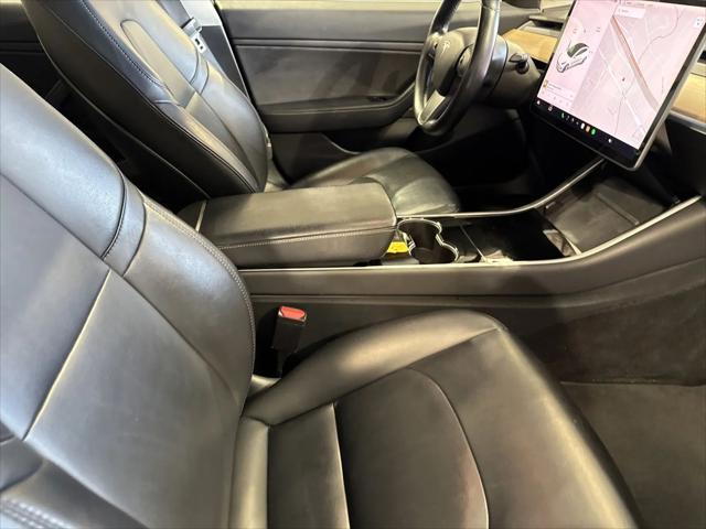 Photo of 2017 white Tesla Model 3