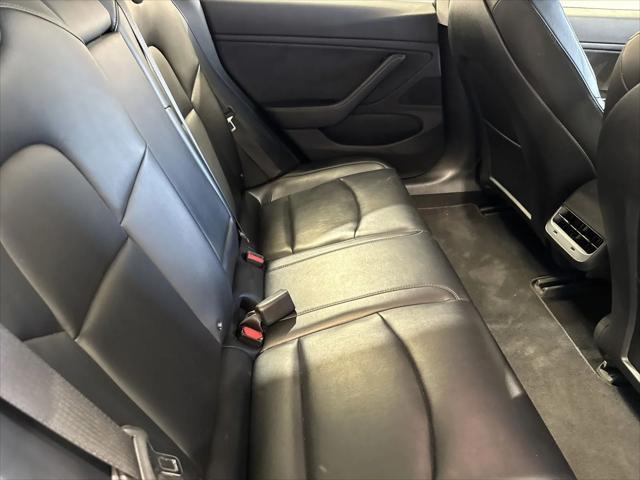 Photo of 2017 white Tesla Model 3