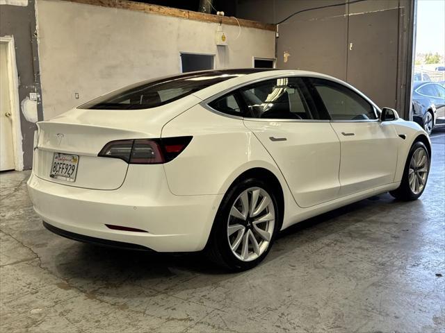 Photo of 2017 white Tesla Model 3