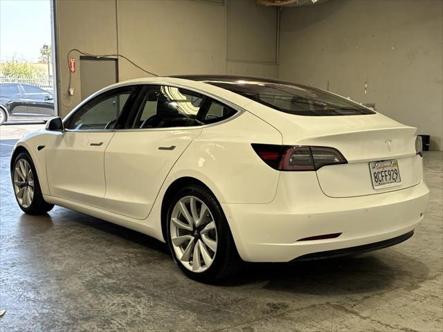 Photo of 2017 white Tesla Model 3