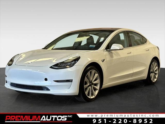 Photo of 2017 white Tesla Model 3