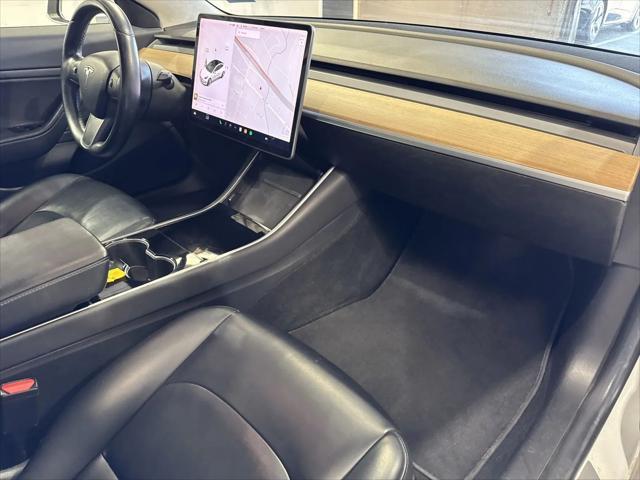 Photo of 2017 white Tesla Model 3