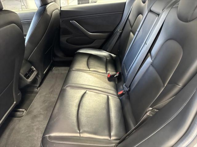 Photo of 2017 white Tesla Model 3
