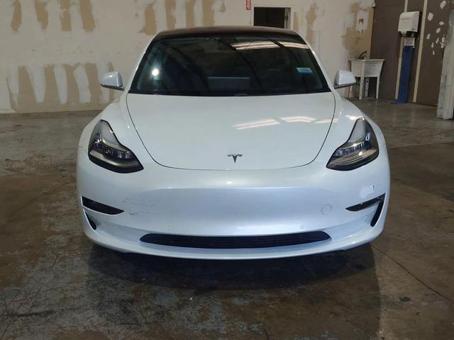 Photo of 2018 white Tesla Model 3