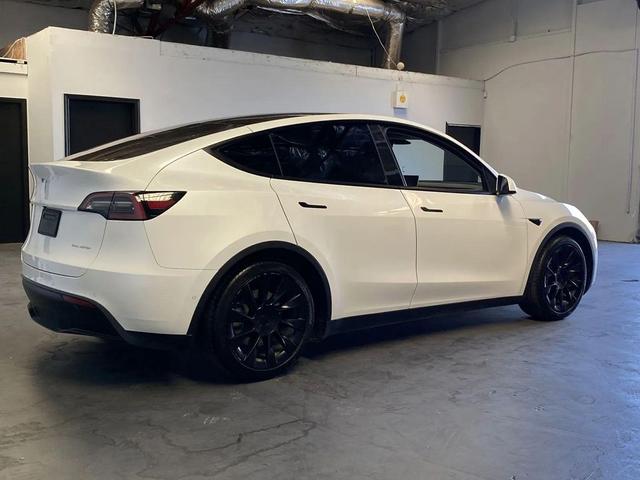 Photo of 2021 white Tesla Model Y