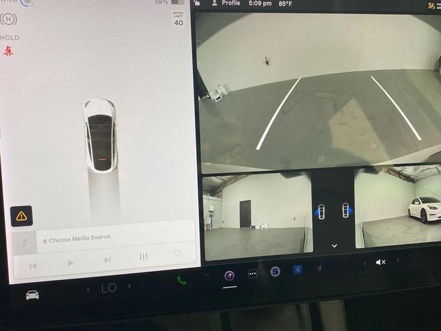 Photo of 2021 white Tesla Model Y