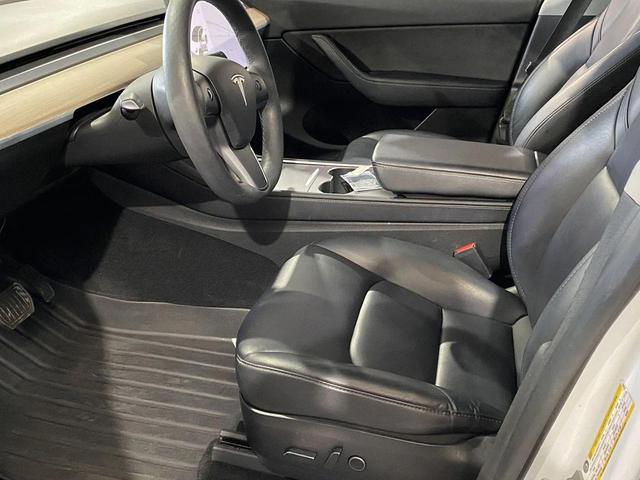Photo of 2021 white Tesla Model Y