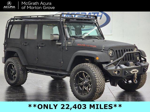 Photo of 2016 Black Clearcoat Jeep Wrangler Unlimited