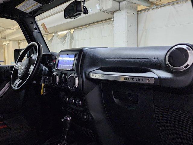 Photo of 2016 Black Clearcoat Jeep Wrangler Unlimited