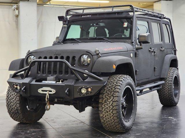 Photo of 2016 Black Clearcoat Jeep Wrangler Unlimited