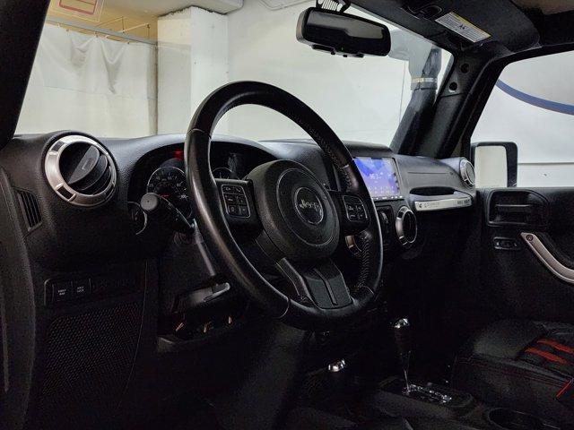 Photo of 2016 Black Clearcoat Jeep Wrangler Unlimited