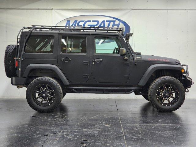 Photo of 2016 Black Clearcoat Jeep Wrangler Unlimited