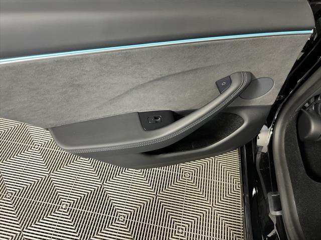 Photo of 2024 Solid Black Tesla Model 3