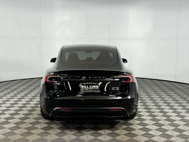 Photo of 2024 Solid Black Tesla Model 3